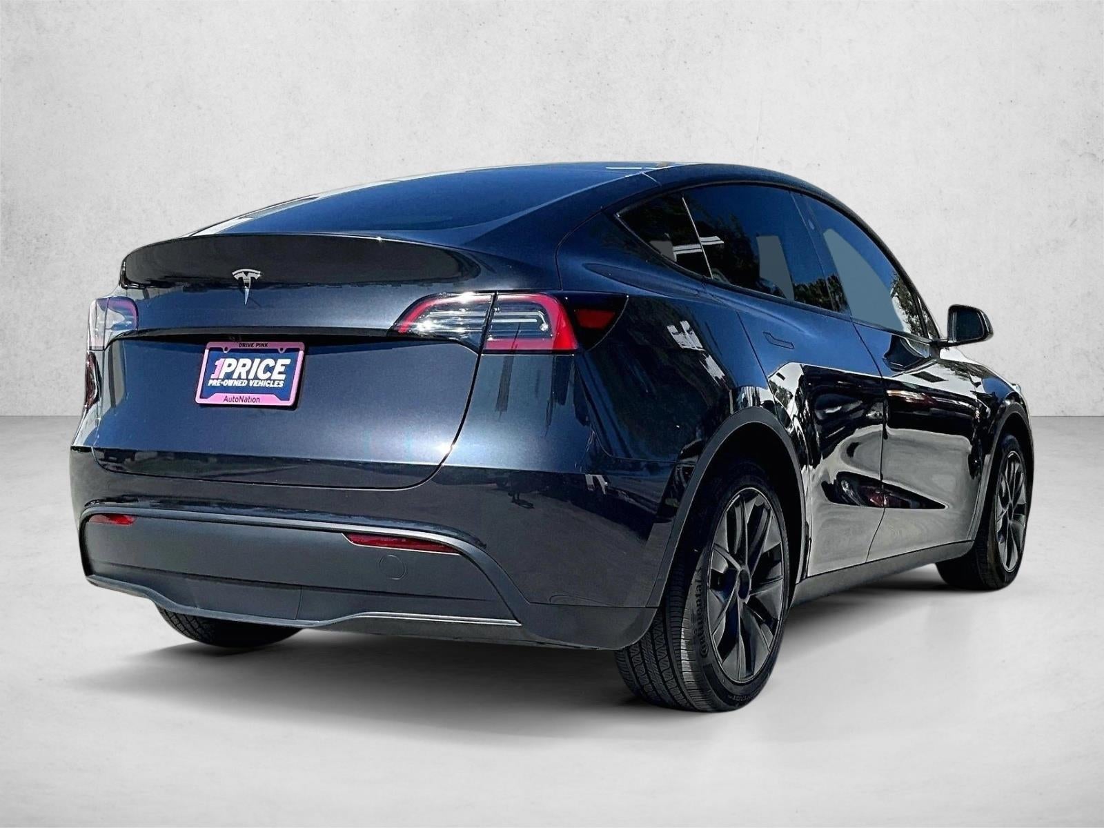 Used 2025 Tesla Model Y Long Range with VIN 7SAYGDED2SF229367 for sale in Miami, FL