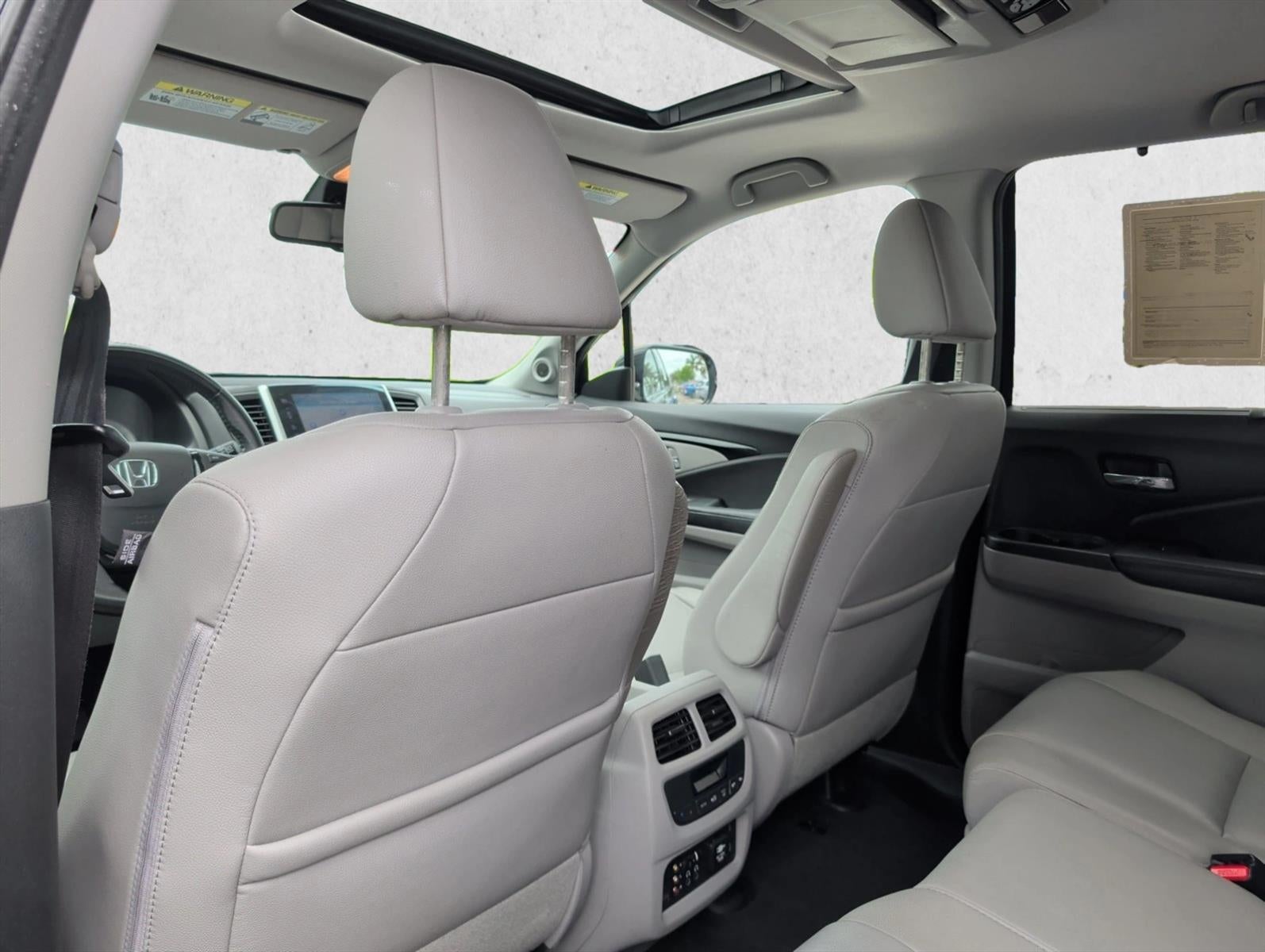 2016 Honda Pilot AWD Touring with DVD Rear Entertainment System and Navigation
