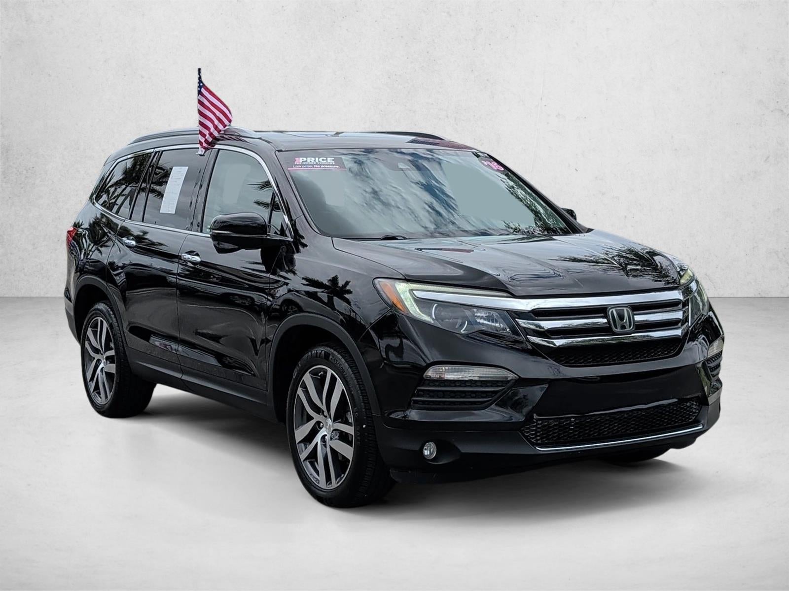 2016 Honda Pilot AWD Touring with DVD Rear Entertainment System and Navigation